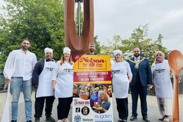 Representatives from Nelson Town Council and Sugden Ltd launched the food festival in Nelson Town Centre